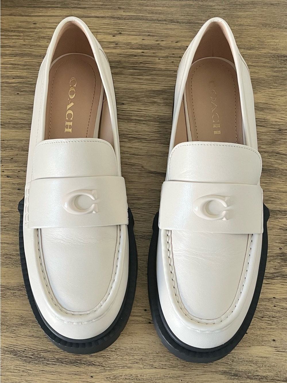 Coach Women's Cream Leather Loafers with Black Soles